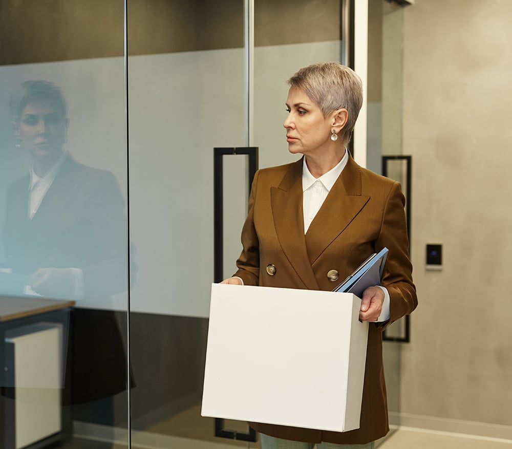 mature-woman-leaving-job-2026-03-19-23-31-45-utc-2